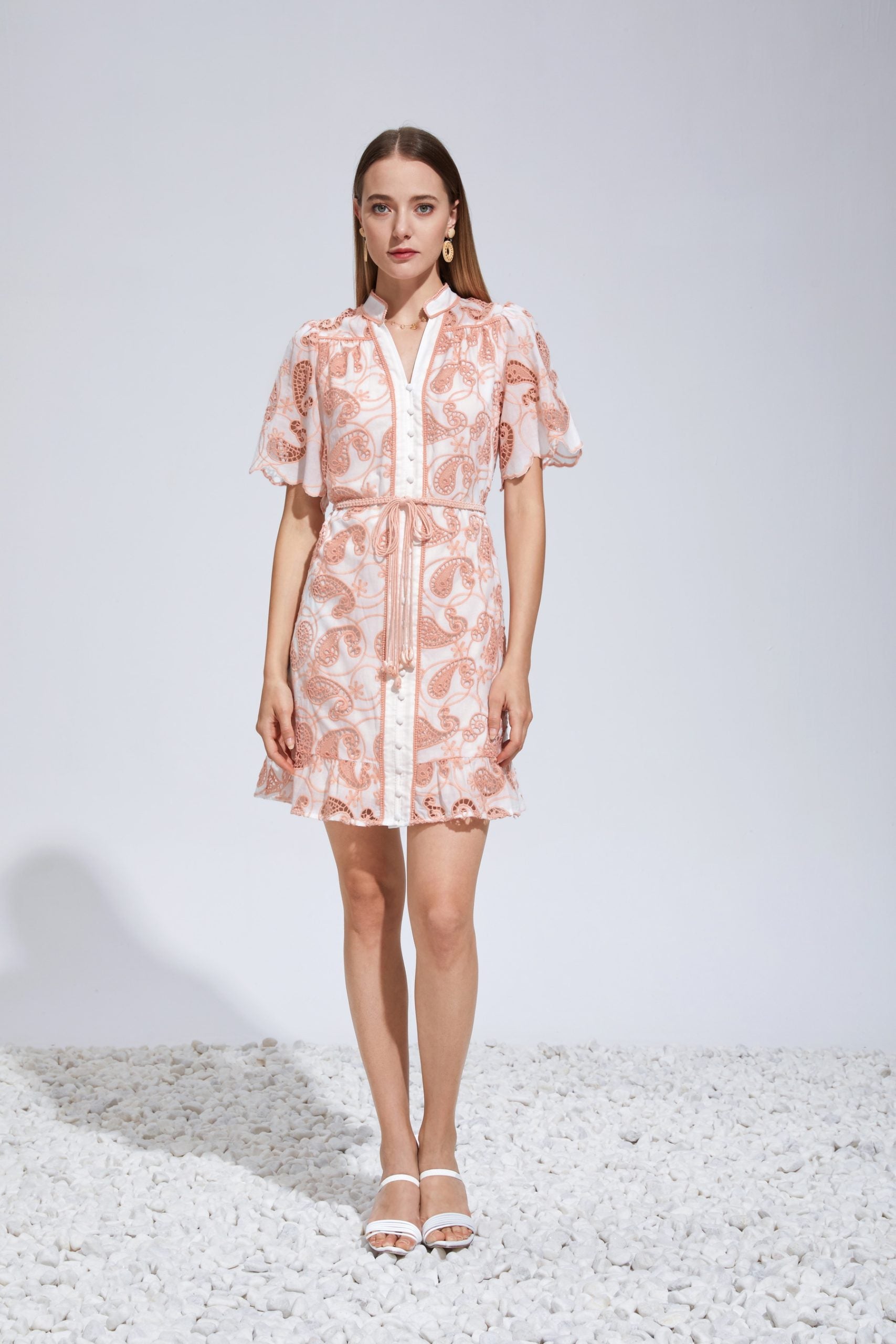 "Turn heads with our floral embroidered short midi dress. Effortless elegance awaits. Buy now!"