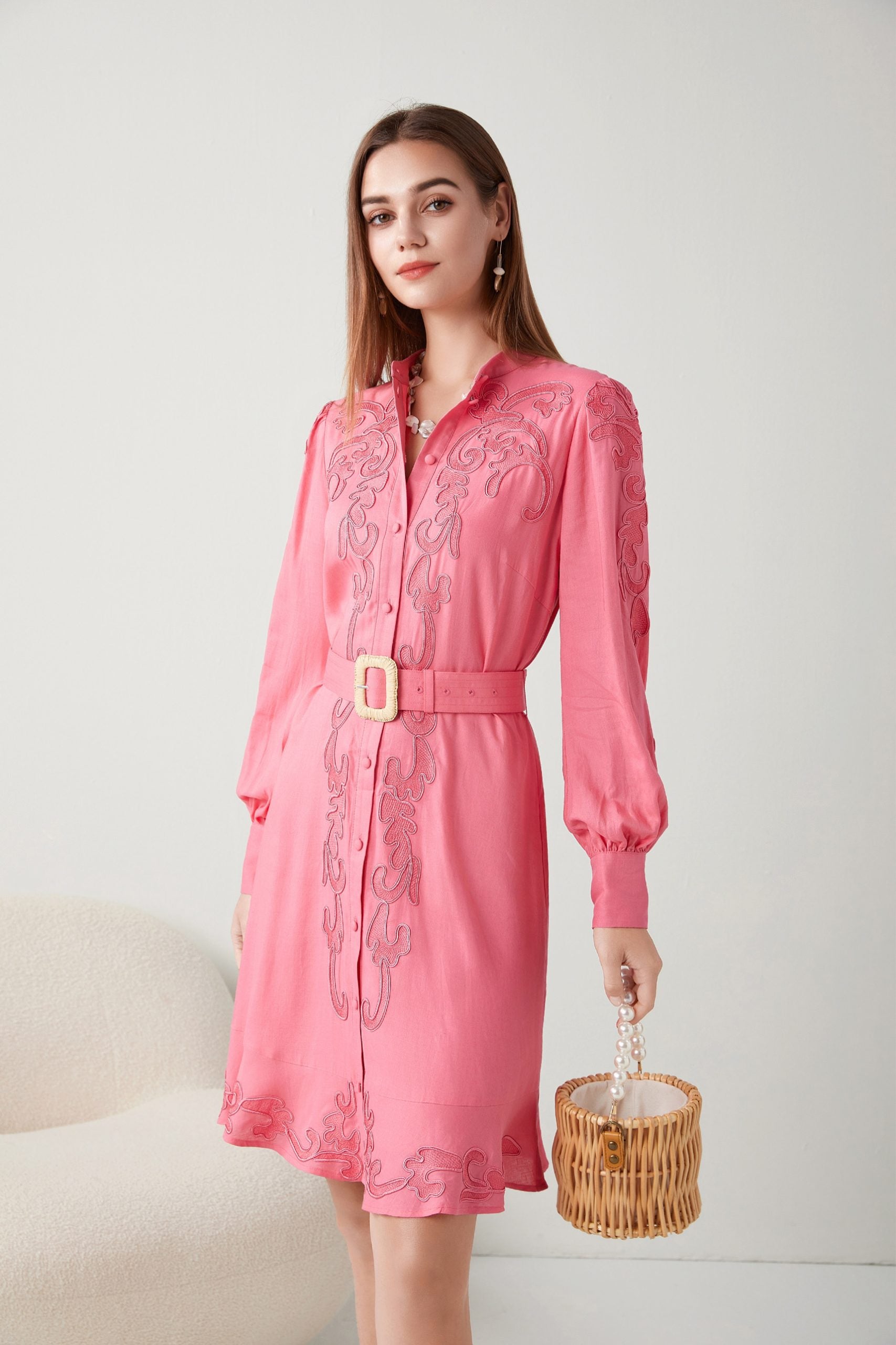"Step into spring with our stunning pink dress, adorned with delicate floral embroidery. Embrace femininity with every step