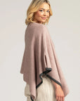 Stay cozy in style with our light pink merino wool poncho. Effortlessly chic and irresistibly soft. Shop now!