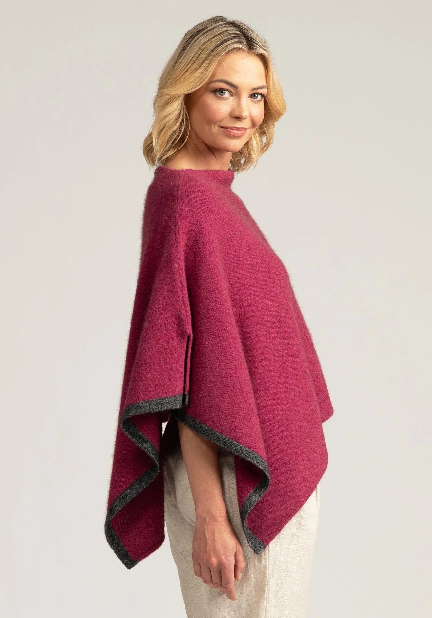 Stay warm in style with our Pink Merino Wool Poncho. Versatile, comfortable, and irresistibly elegant.