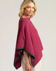 Stay warm in style with our Pink Merino Wool Poncho. Versatile, comfortable, and irresistibly elegant.