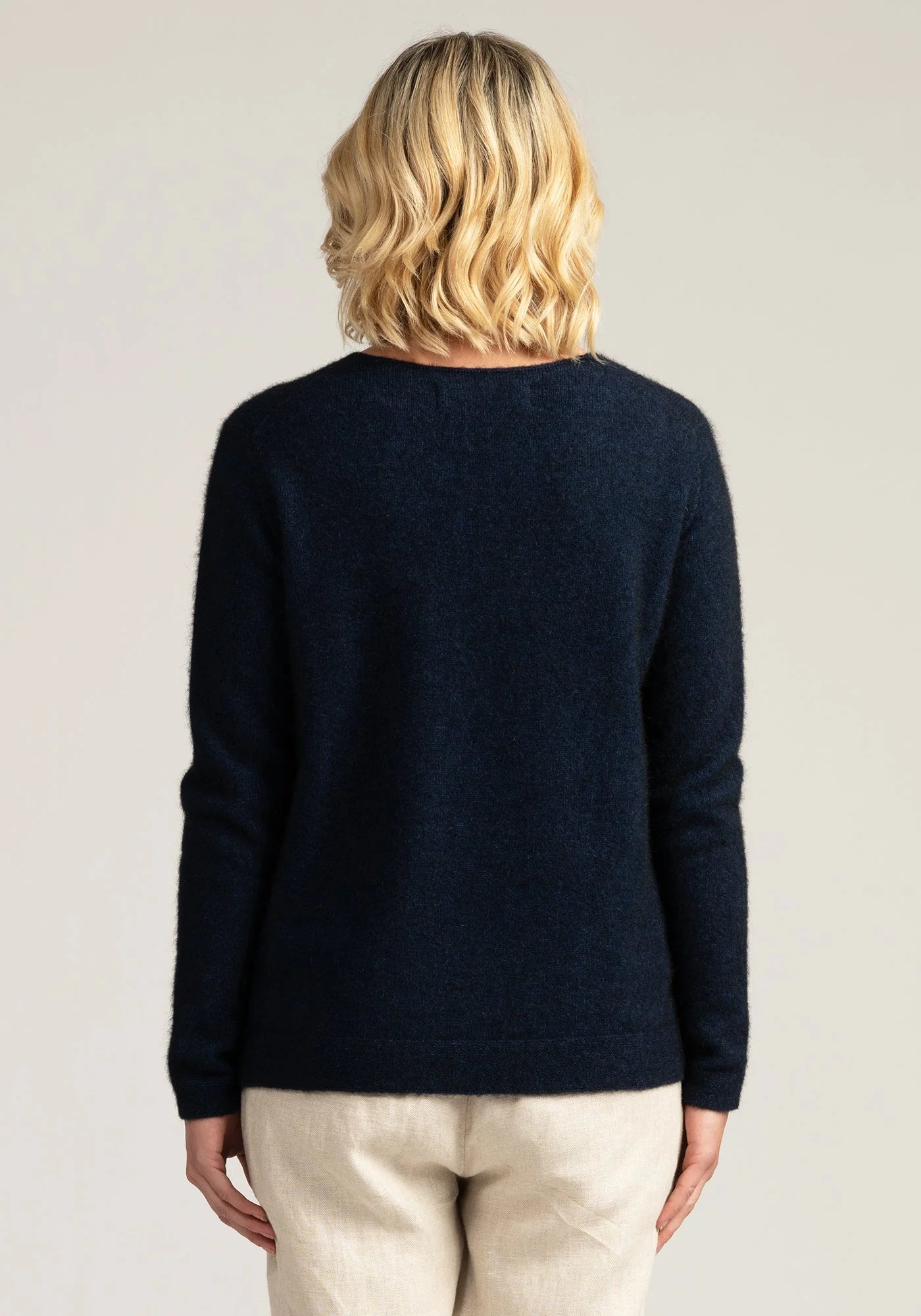Upgrade your knitwear collection with our navy merino wool jumper. Style and warmth combined!