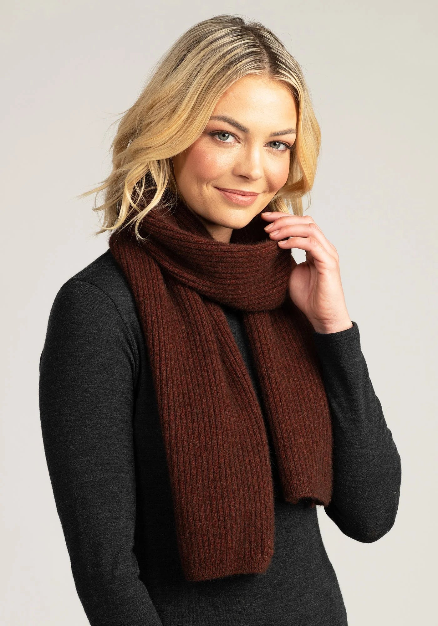 Stay cozy in style with our rust ribbed merino wool scarf. Ultra-soft and versatile, it's a winter must-have!