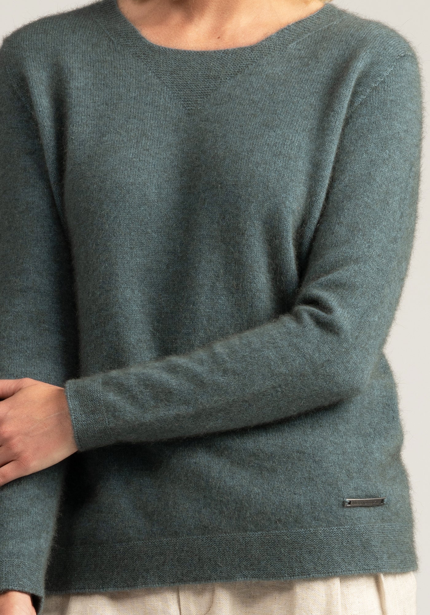 "Upgrade your wardrobe with our grey merino wool sweater. Soft, warm, and timeless. Get yours today!"