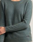 "Upgrade your wardrobe with our grey merino wool sweater. Soft, warm, and timeless. Get yours today!"