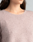 "Elevate your wardrobe with our light blush pink merino wool sweater. Unbeatable comfort, unmatched style."