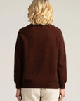 "Experience warmth in style with our rust merino wool sweater. Luxuriously soft and timeless. Shop now!"