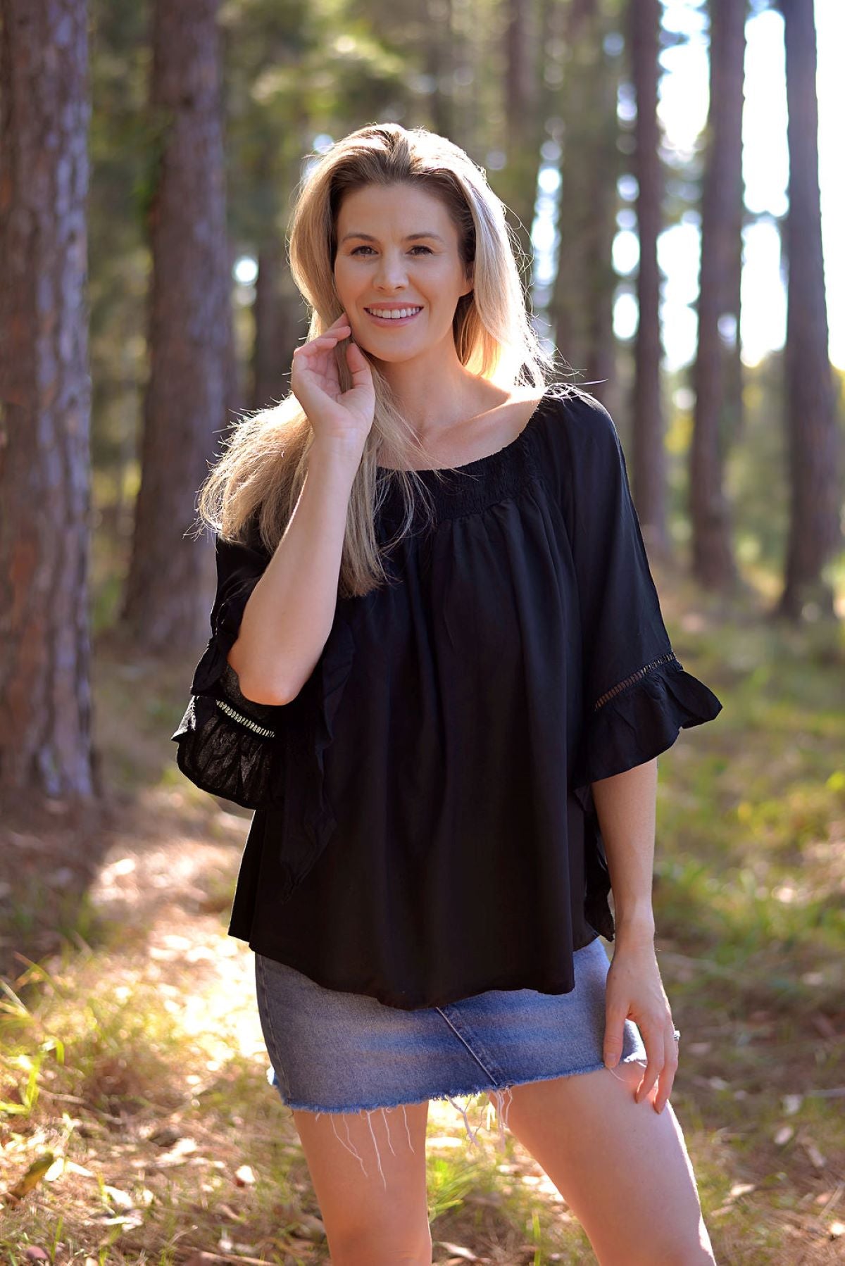 Turn heads with our off-shoulder black top. Sleek, stylish, and versatile, it's a must-have for your collection. Get yours today and shine at any event!