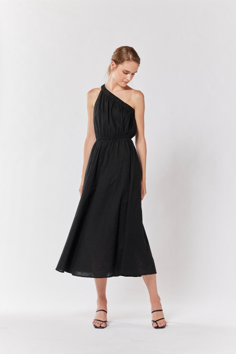 "Sleek sophistication: Black one-shoulder dress for every occasion. Get yours!"