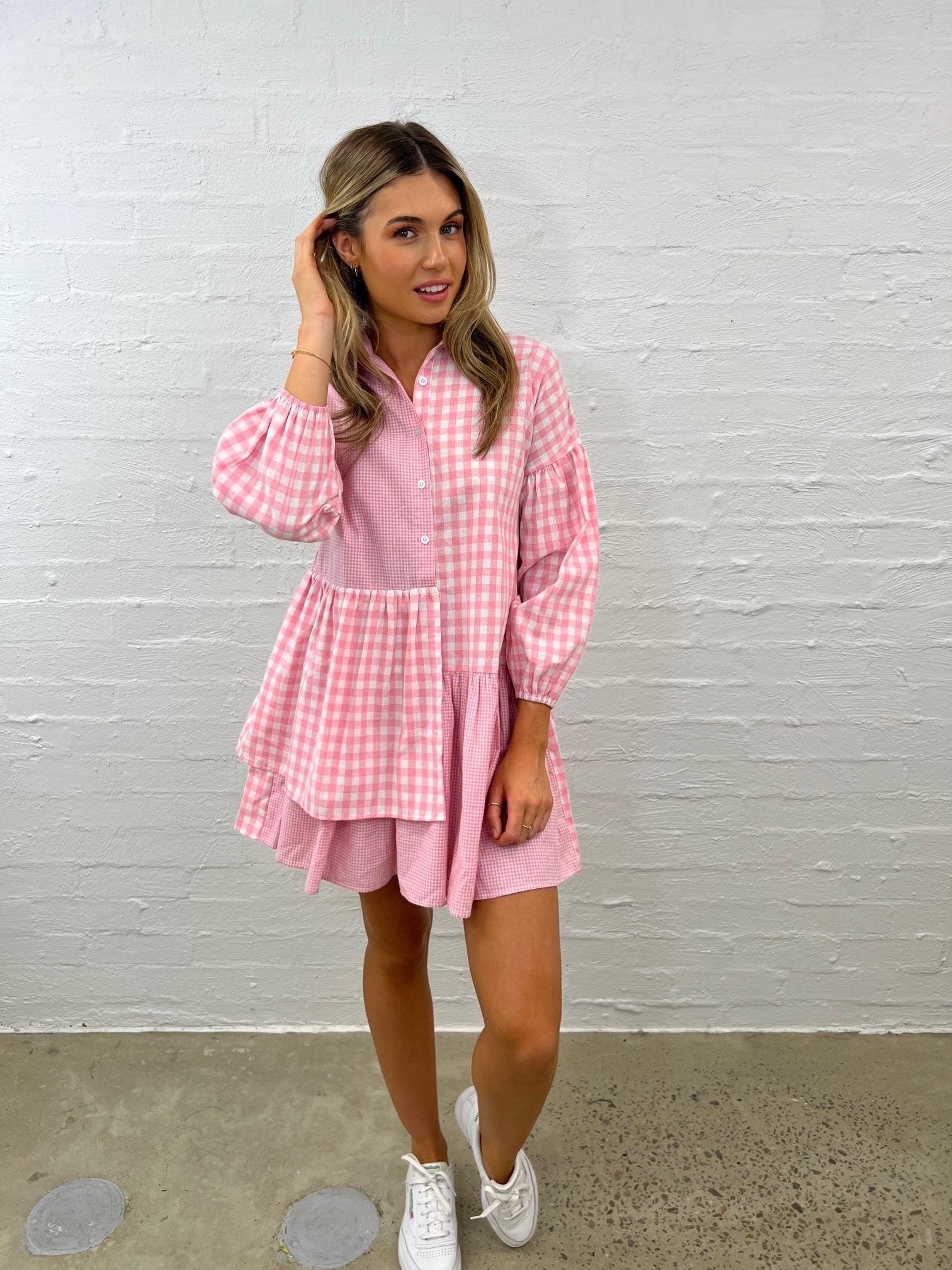 Turn heads in pink: Gingham shirt dress. Effortless, chic, and irresistibly stylish. Shop the look today!