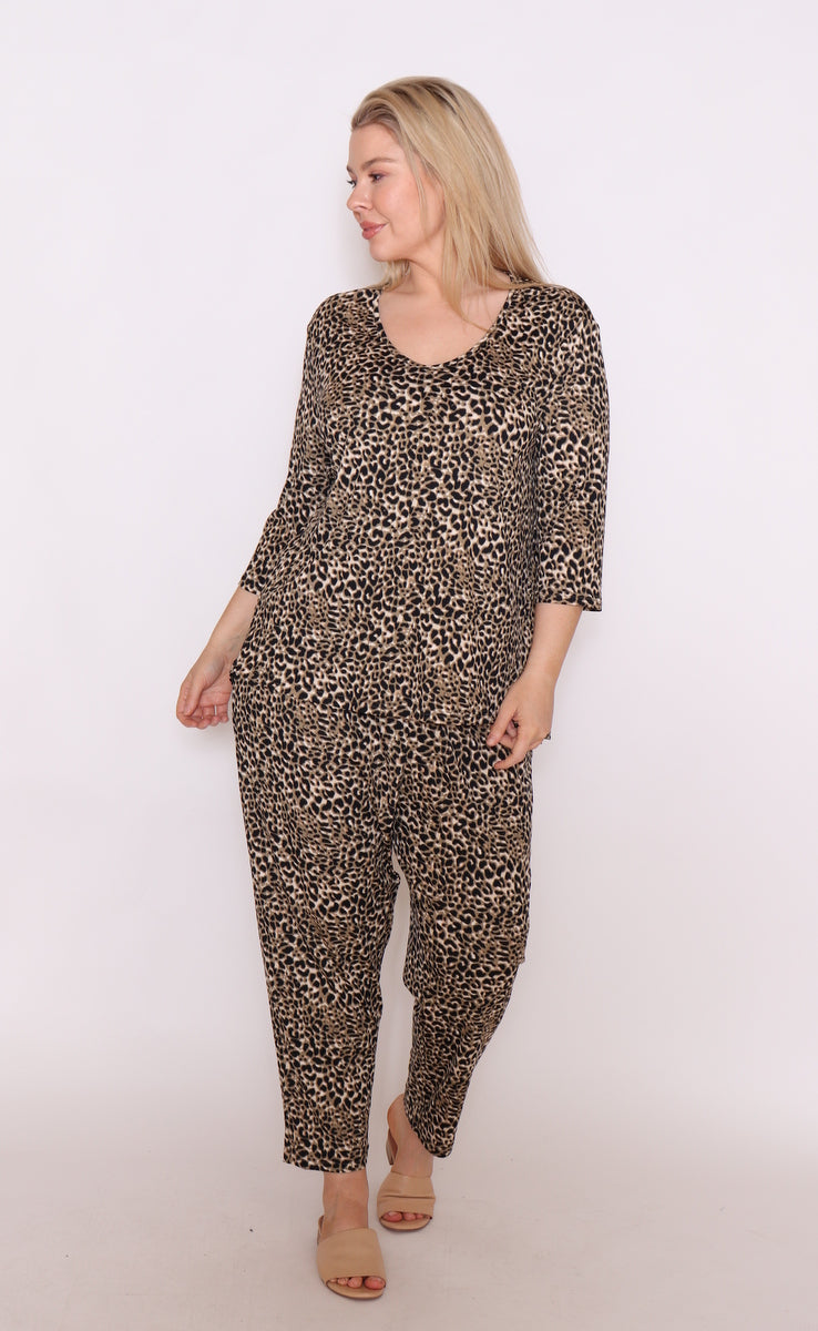 Embrace bold fashion with our plus-size leopard print top and pant. Made from soft cotton for all-day comfort &amp; style. Get yours today!