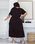 Find the ideal plus-size black dress to suit your curves and style. Embrace elegance with our versatile selection.