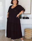 Elevate your wardrobe with our stunning plus-size black dresses. Feel confident and fabulous in every occasion.