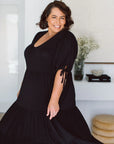 Explore our trendy plus-size black dresses for a perfect blend of style and comfort. Your go-to for any occasion!