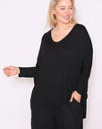 "Discover confidence in our plus-size black cotton top. Effortless elegance, full sleeves, tailored for your curves. Buy now