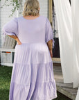 Step into sophistication with our lilac plus-size flowy dress. Embrace your curves and captivate in style. Buy now!