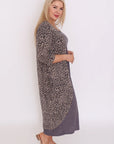 Unleash your wild side! Plus-size long cardigan in fierce leopard print. Embrace fashion with flair!