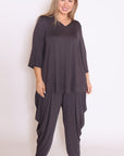 "Grey drape pants for plus sizes: redefine comfort and style! Embrace the elegance of loose-fit perfection in our must-have collection."
