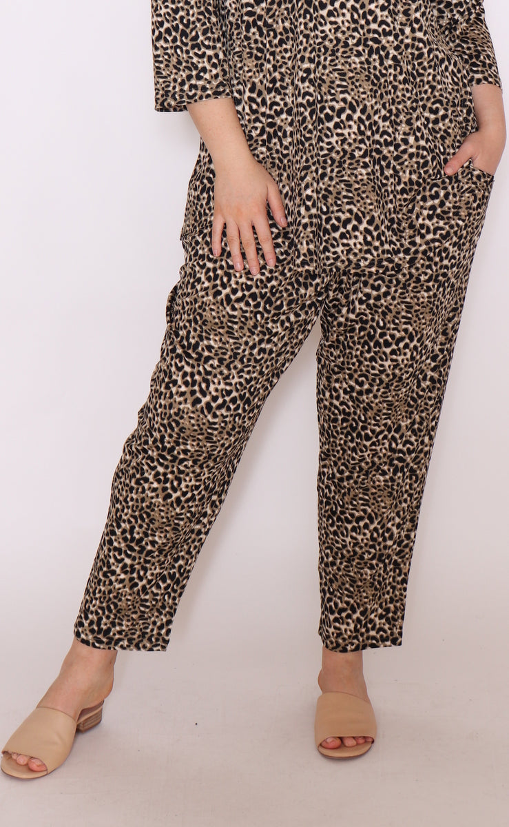 "Unleash your inner fashionista with plus-size soft cotton leopard print pants. Comfy, trendy, and perfect for any occasion. Order now and stand out!"