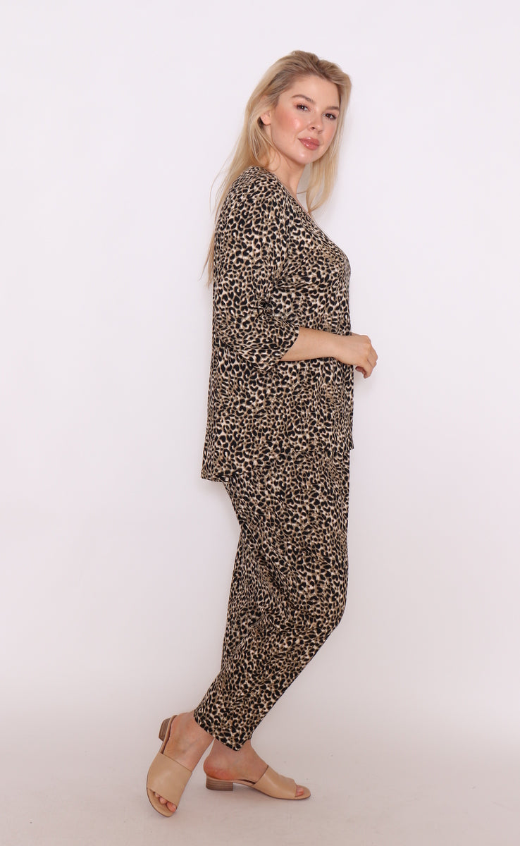 "Elevate your wardrobe with our plus-size soft cotton leopard print pants. Cozy, chic, and curve-friendly. Get yours today and roar with confidence!"