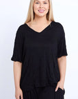 Upgrade your wardrobe with our plus-size soft cotton black top. Soft, stylish, and versatile - a must-have for any season. Order yours now!