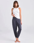 "Experience unparalleled softness in our charcoal relaxed-fit pants. Your go-to for yoga and lounging bliss."