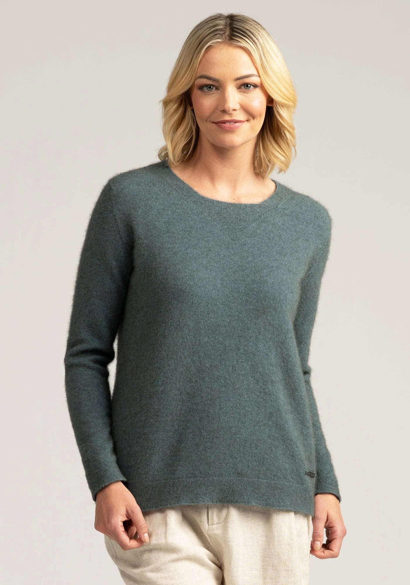 "Elevate your look with our grey merino wool sweater. Superior warmth, style, and durability in one."