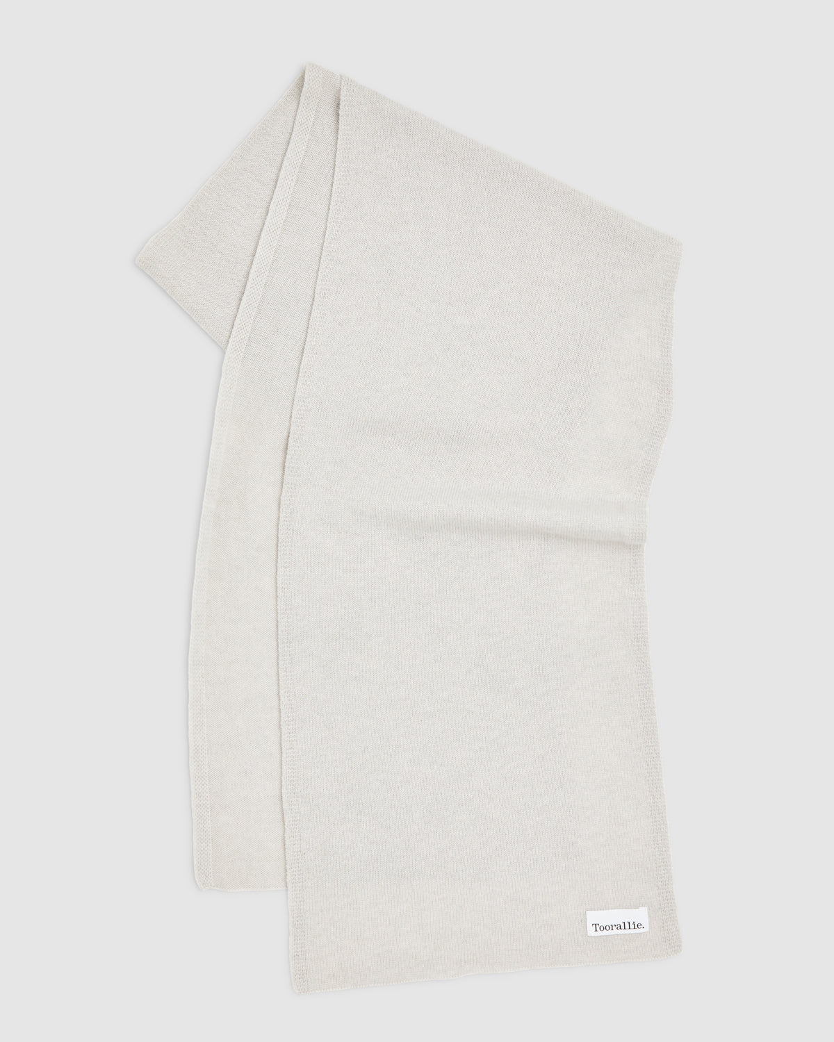 Stay cozy in style with our light grey fine wool scarf. A must-have accessory for any wardrobe.