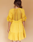 "Step into summer with flair! Discover our stunning yellow midi dress now."